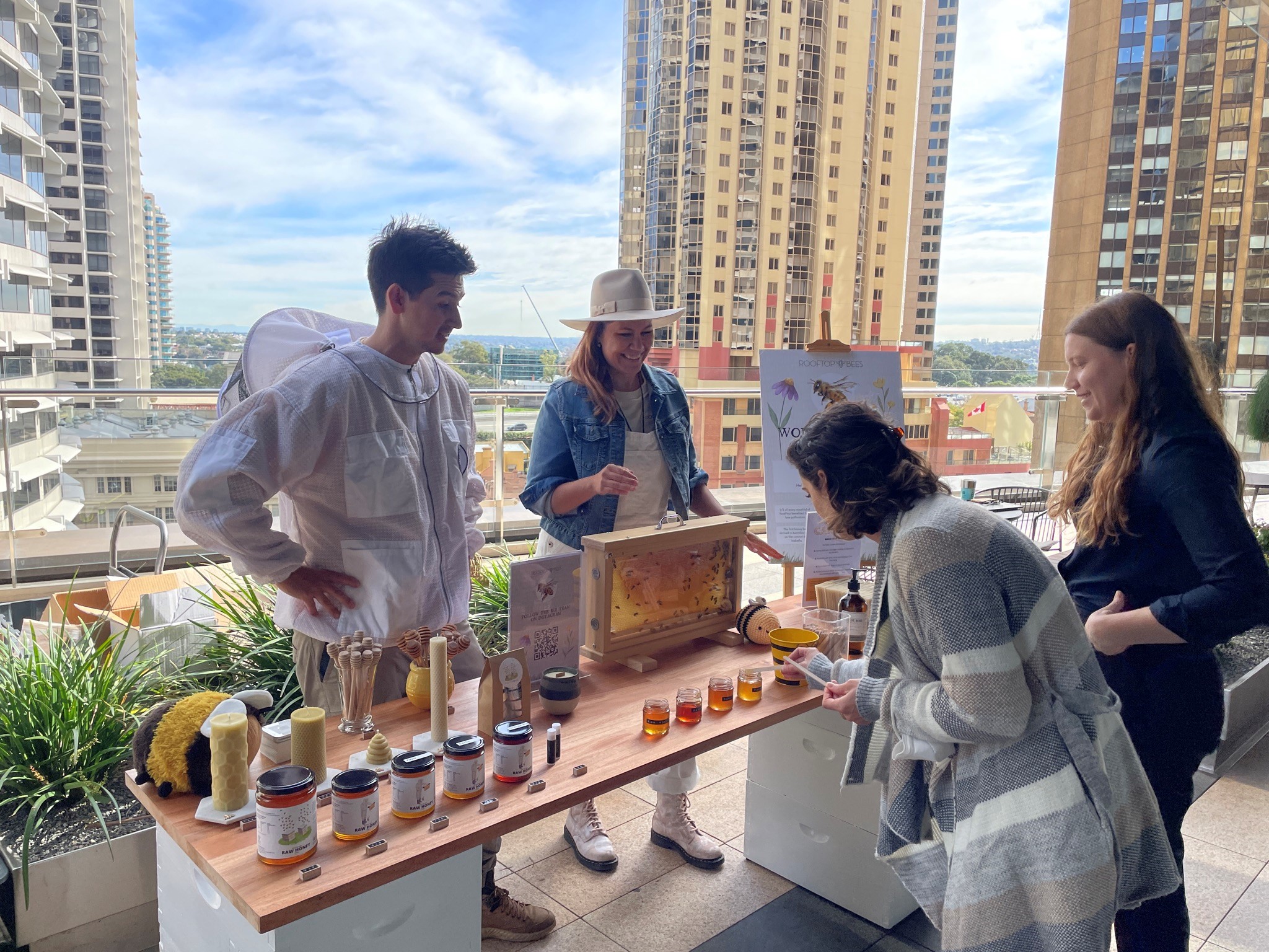 Rooftop Bees market stall with live bee display